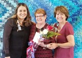 Mayra Aguirre, Adventist Health Volunteer Services Manager, Mary Ann Heman-Landis and Maria Davis, Adventist Health Volunteer Services Administrative Assistant.